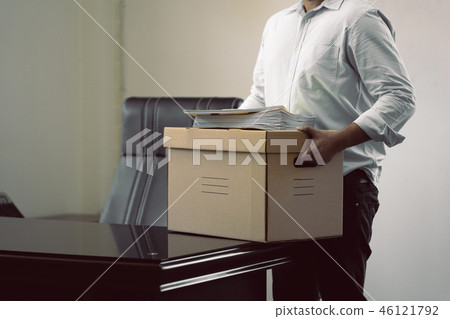 Businessmen or employees holding boxes Businessmen or employees holding boxes 46121792