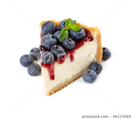 Piece of cheesecake with blueberries and mint 46125069