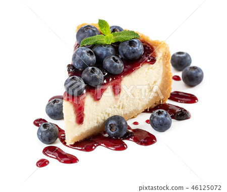 Piece of cheesecake with blueberries and mint 46125072