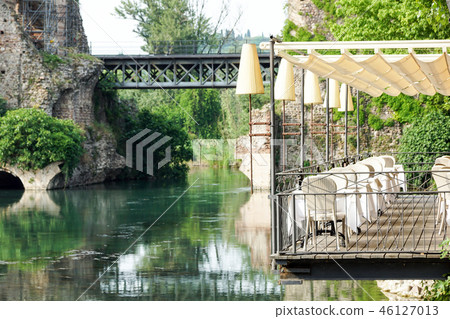 Beautiful terrace of a restaurant above the river 46127013