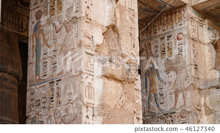 Temple of Medinet Habu. Egypt, Luxor. The Mortuary Temple of Ramesses III at Medinet Habu is an Temple of Medinet Habu. Egypt, Luxor. The Mortuary Temple of Ramesses III at Medinet Habu is an 46127340