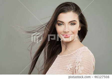 Cheerful woman brunette with long healthy hair  46127508