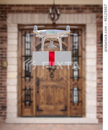 Unmanned Aircraft System (UAV) Quadcopter Drone Delivering Box W 46129867