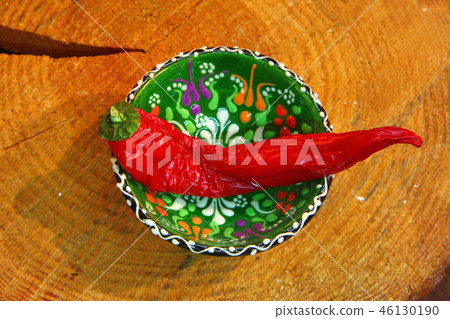 red chilli pepper wooden background red chilli pepper wooden background 46130190