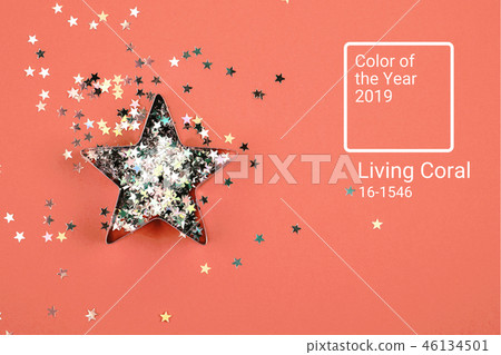 Star with sparkles on Living Coral background. Star with sparkles on Living Coral background. 46134501