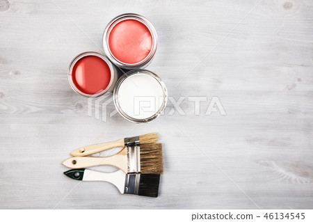 Paint cans and brushes on white background Paint cans and brushes on white background 46134545