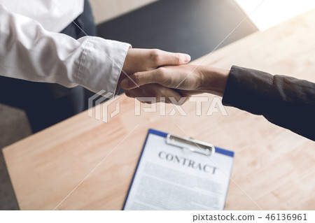 Confident partnerships people shaking hands 46136961
