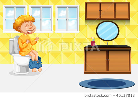 Boy taking the toilet 46137818