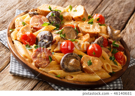penne with grilled chicken, wild mushrooms penne with grilled chicken, wild mushrooms 46140681