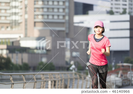 A young lad who jogs 46140966
