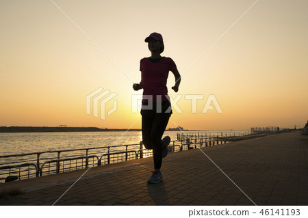 Jogging at sunset Jogging at sunset 46141193