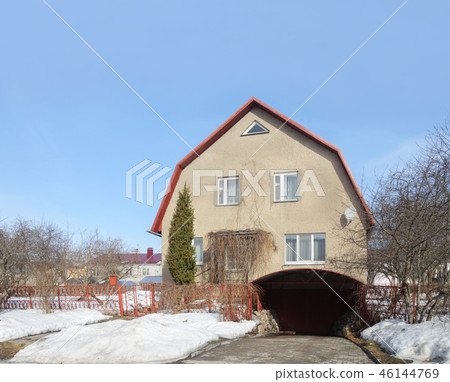 Country house with garage in spring time 46144769