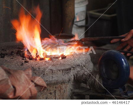 glowing thick silver plate on hot flame glowing thick silver plate on hot flame 46146417