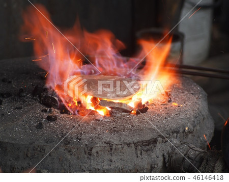 glowing thick silver plate on hot flame glowing thick silver plate on hot flame 46146418