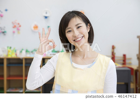 Mr. Hojo who gives an OK sign 46147412