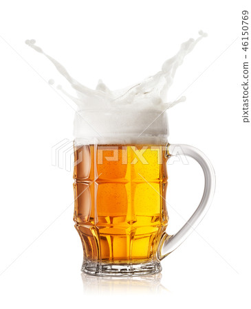Foam splash in faceted beer mug Foam splash in faceted beer mug 46150769