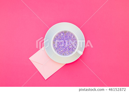 Cup of beautiful lilac flowers infused water Cup of beautiful lilac flowers infused water 46152872