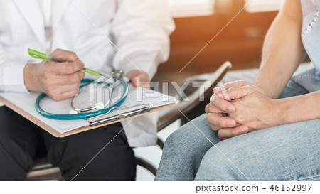 Doctor or psychiatrist consulting stressful woman  46152997