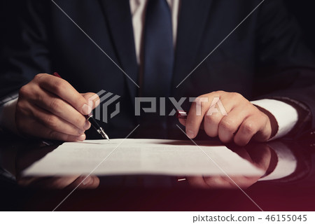 Lawyer, attorney signing a contract 46155045