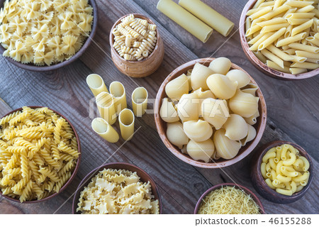 Various types of pasta on the white background 46155288