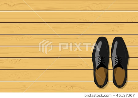 Top view of black leather men's shoes on wooden Top view of black leather men's shoes on wooden 46157307