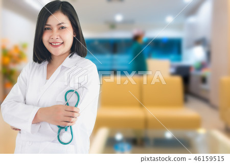 Portrait of female doctor standing Portrait of female doctor standing 46159515