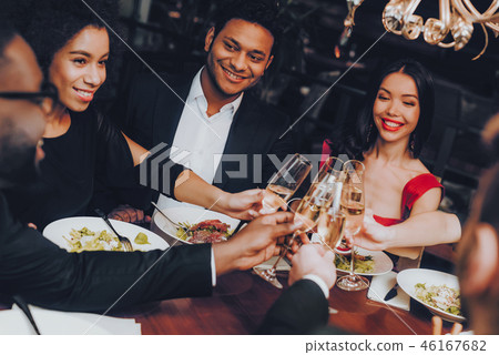 Friends Chilling Out Enjoying Meal in Restaurant Friends Chilling Out Enjoying Meal in Restaurant 46167682