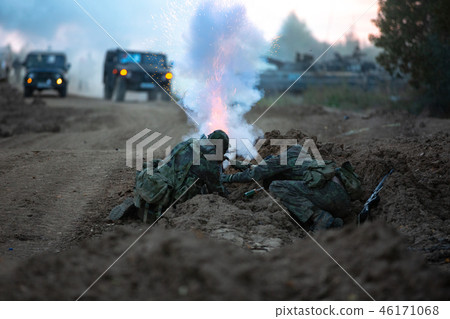 group of soldiers on the Outdoor on army exercises. war, army, technology and people concept group of soldiers on the Outdoor on army exercises. war, army, technology and people concept 46171068