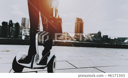 Businessman is Riding on Gyroboard 46171303