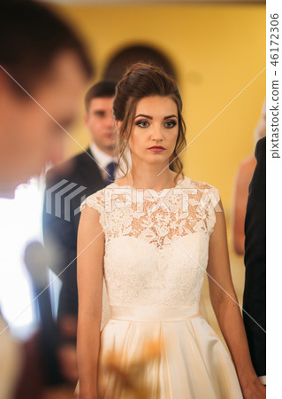 Bride and groom on wedding ceremony in church 46172306