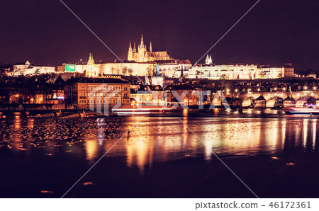 Castle and Charles bridge mirroring in Vltava Castle and Charles bridge mirroring in Vltava 46172361