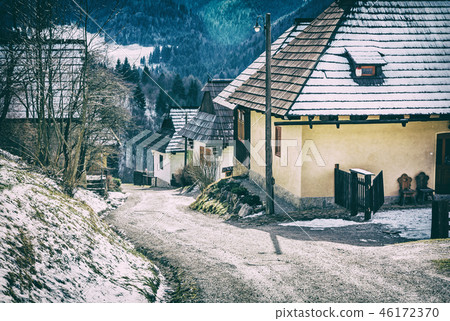 Colorful wooden houses in Vlkolinec, analog filter 46172370