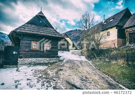 Colorful wooden houses in Vlkolinec, analog filter 46172372