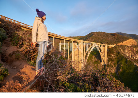 Woman tourist near Bixby Creek Bridge in California 46174675