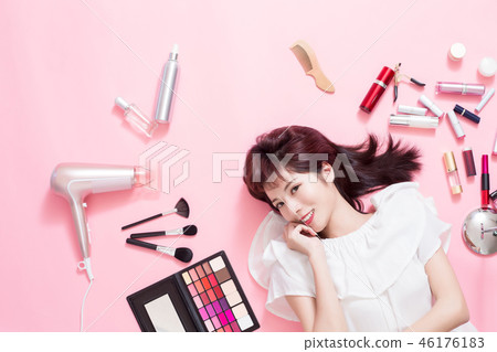 woman smile with makeup tools woman smile with makeup tools 46176183