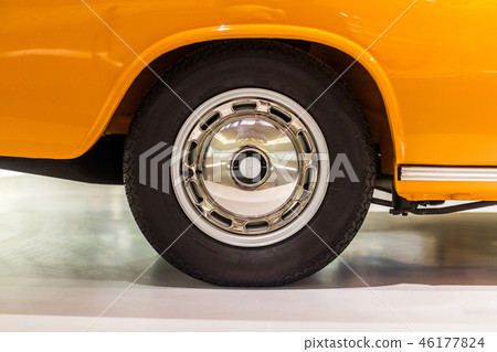 Polished car rim with black vintage wheel Polished car rim with black vintage wheel 46177824