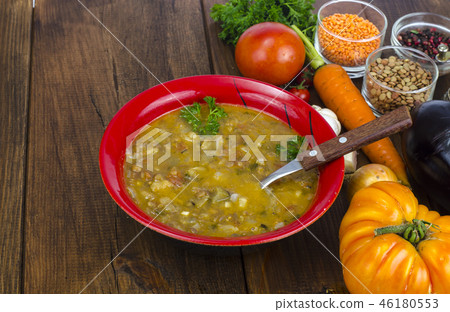 Vegetable soup with lentils and aubergines Vegetable soup with lentils and aubergines 46180553