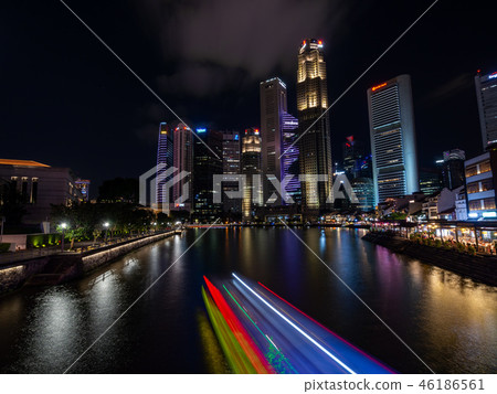 The night view of Singapore and the light trace of the houseboat The night view of Singapore and the light trace of the houseboat 46186561