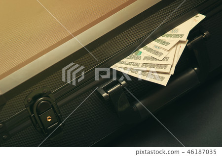Black suitcase with russian rubles. 46187035