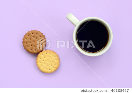 Coffee break flat lay composition with sandwich cookies Coffee break flat lay composition with sandwich cookies 46188457