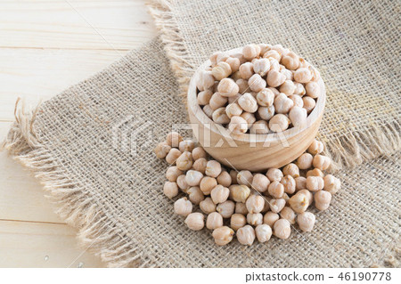 beautiful chickpeas on wood cup beautiful chickpeas on wood cup 46190778
