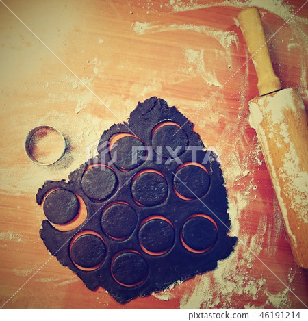 Baking Christmas cookies. On the wooden table. Baking Christmas cookies. On the wooden table. 46191214