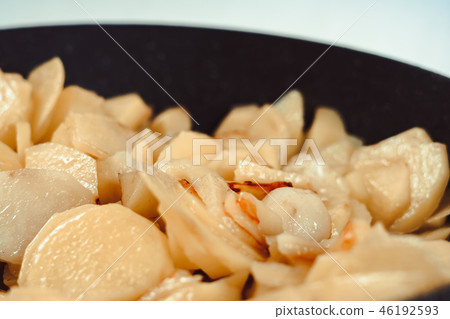fried potatoes in a pan fried potatoes in a pan 46192593
