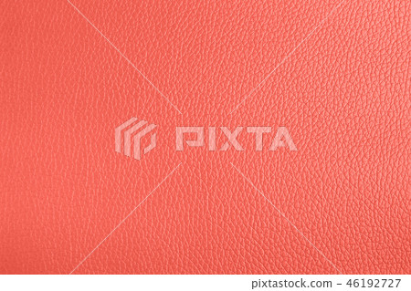 Leather textured background in living coral color. Leather textured background in living coral color. 46192727