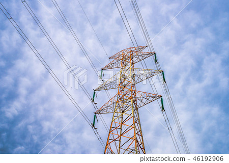 Power transmission towers and wires in colorful colors under a cloudy sky Power transmission towers and wires in colorful colors under a cloudy sky 46192906