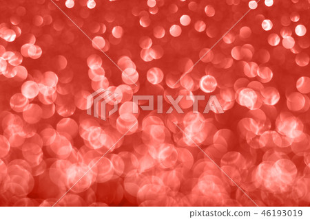 Blurred glitter background living coral color. 46193019