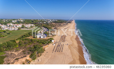 Aerial. View from the sky at the golf courses in the tourist town Vale de Lobo. Vilamoura. 46195060