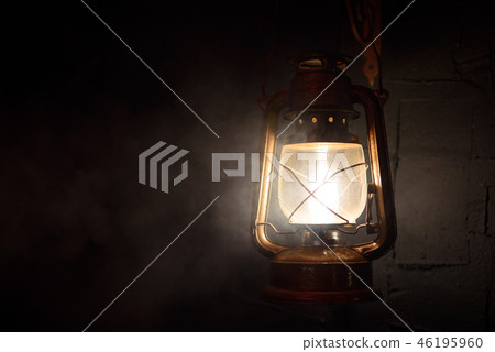 vintage lantern on a dark background vintage lantern on a dark background 46195960