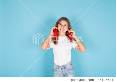 beautiful little girl paprika holds food vegetables 46196683