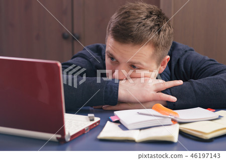 man in tin foil hat fearfully pulls palms forward 46197143